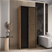 Kleiderschrank Tharo in Eiche/Schwarz mit Schiebetüren, 1 Meter breit, ausziehbare Metallstangen, auch für Wohnzimmer geeignet, viel Stauraum, moderne Optik