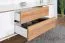 TV-Unterschrank Tuanai 01, Farbe: Eiche / Weiß Hochglanz - 58 x 180 x 47 cm (H x B x T)