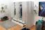 Großer Kleiderschrank | 6 Drehtüren | 4 Schubladen | 8 Fächer | mit 4 Kleiderstangen | 277 cm breit | Farbe: Weiß Abbildung