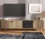 TV-Board / TV-Unterschrank mit genügend Stauraum Zvesdara 02, 2 Meter breit, Farbe: Eiche Artisan / Schwarz, zwei Schubladen, Maße: 54,5 x 208 x 40 cm
