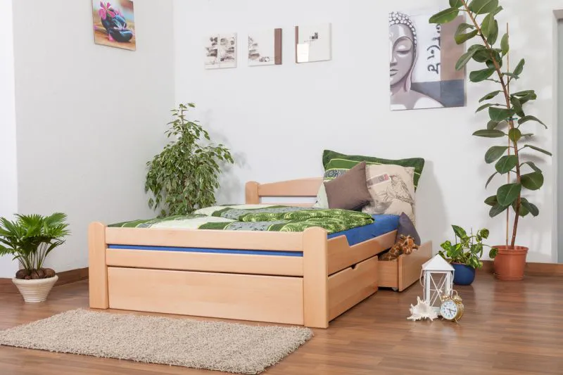 Einzelbett / Stauraumbett "Easy Premium Line" K4, inkl. 2 Schubladen und 1 Abdeckblende, 140 x 200 cm Buche Vollholz massiv Natur